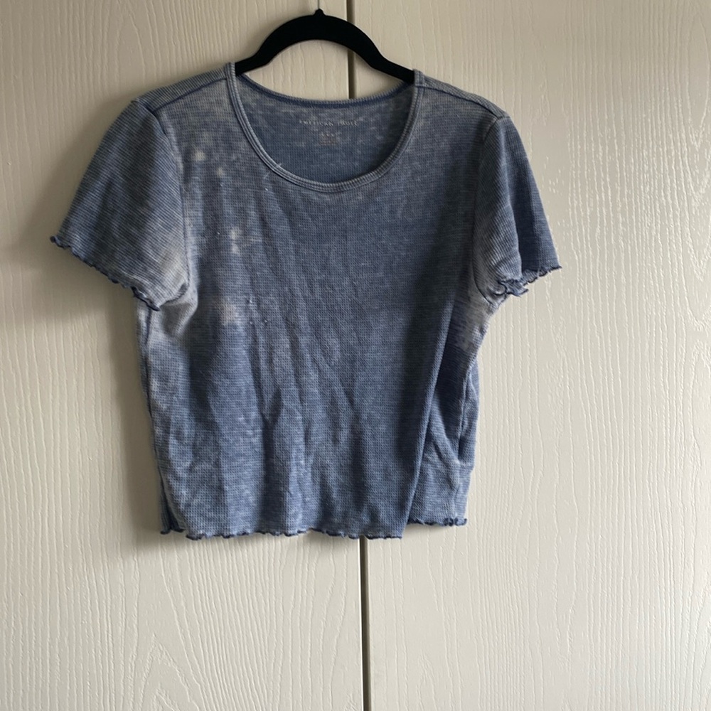 Medium Blue distressed short sleeve crop top. Worn a few times